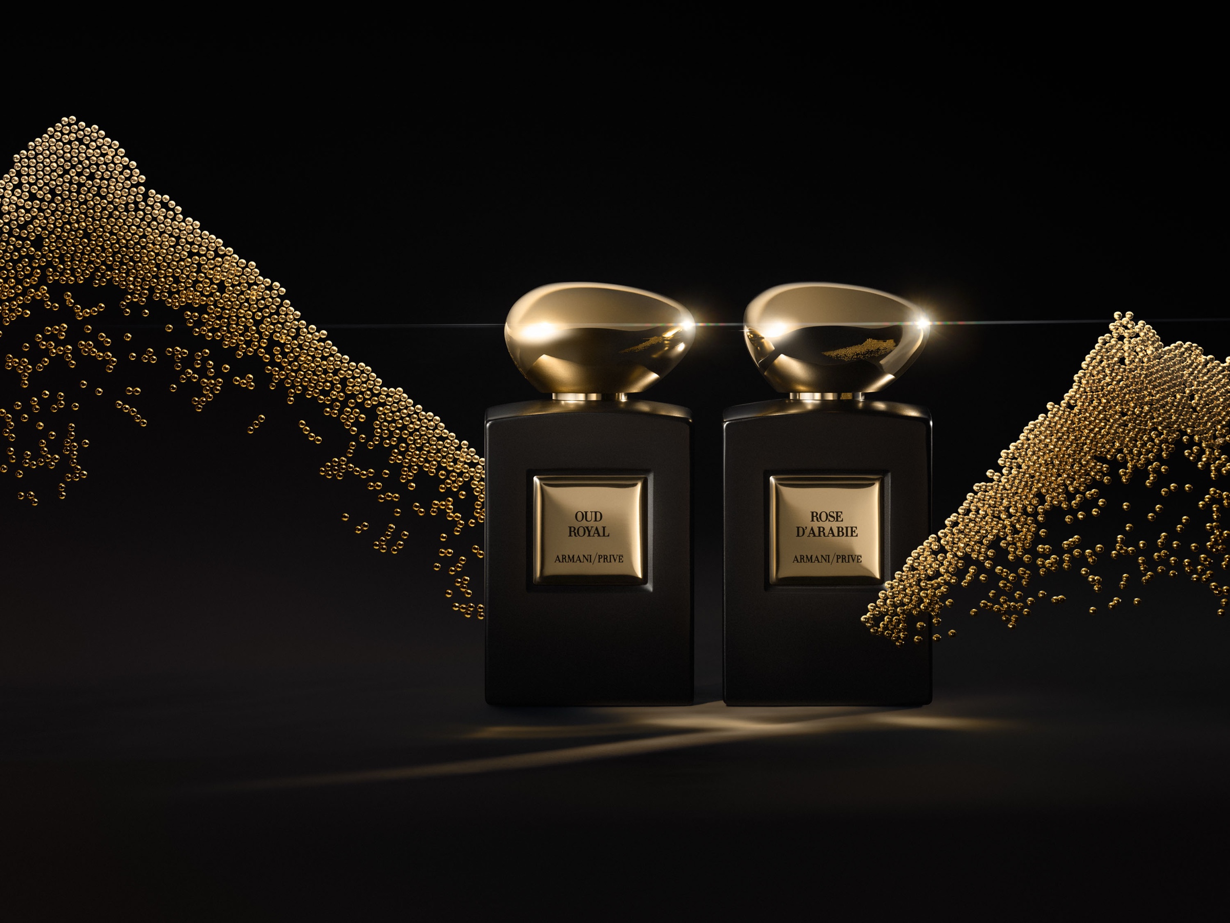 Fragrance bottles on black, reflection holding the surface
